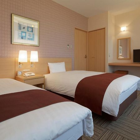 Kanazawa Tokyu Hotel Eksteriør bilde A typical room at the hotel