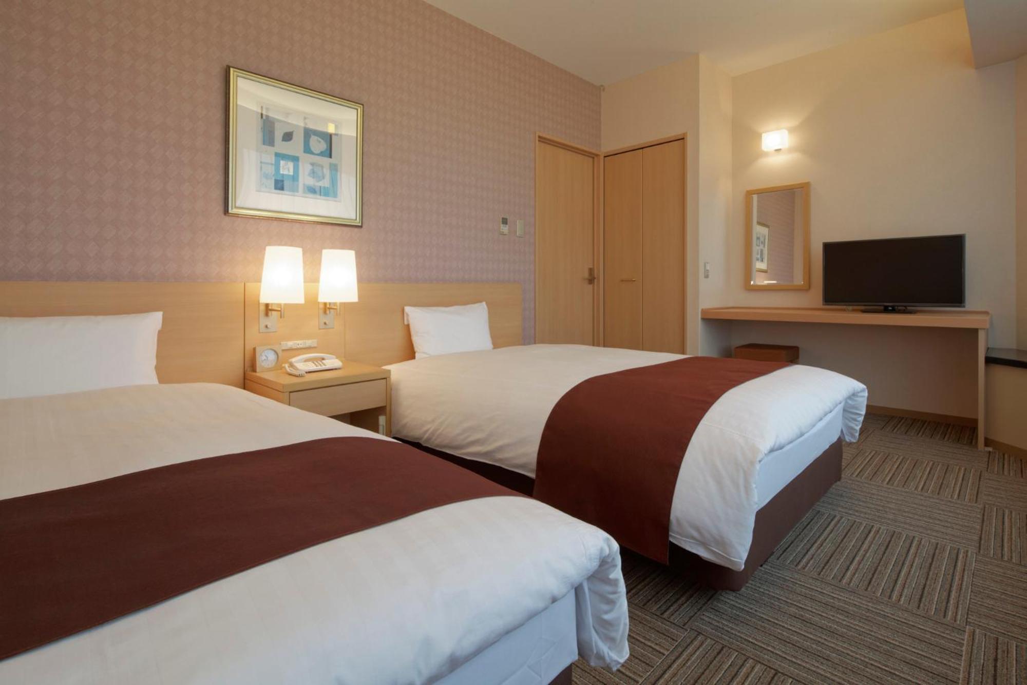 Kanazawa Tokyu Hotel Eksteriør bilde A typical room at the hotel
